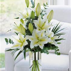White scented lily vase